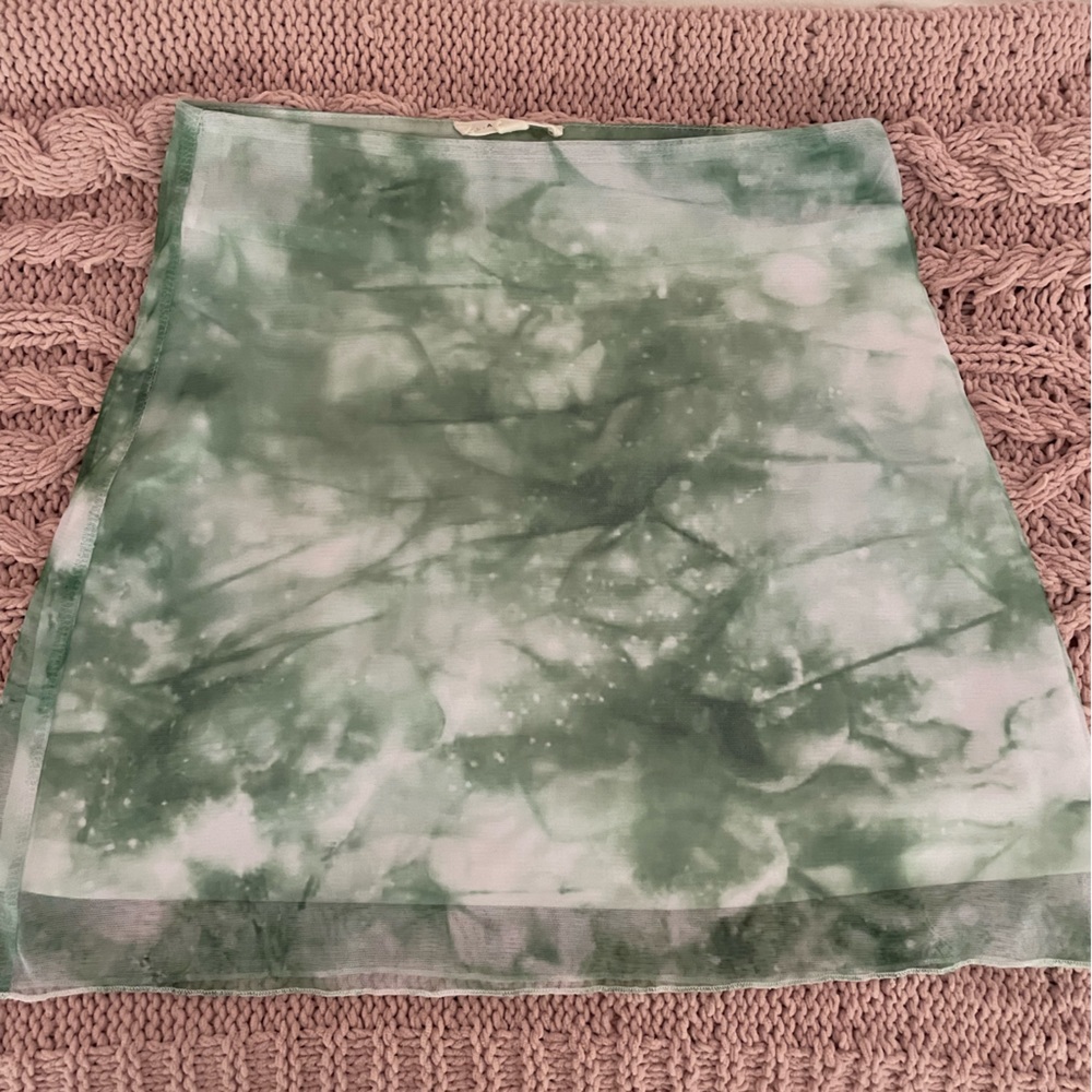 green and white mini skirt